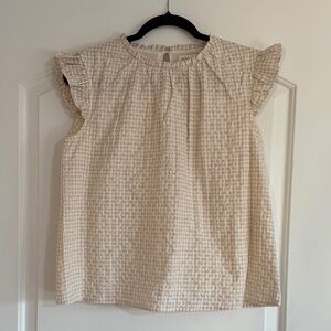 Eyelet blouse with ruffled cap sleeves